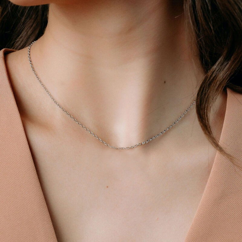 Delicate 16-inch gold chain, perfect for layering and everyday wear. Adds a sleek, sophisticated touch to any outfit.