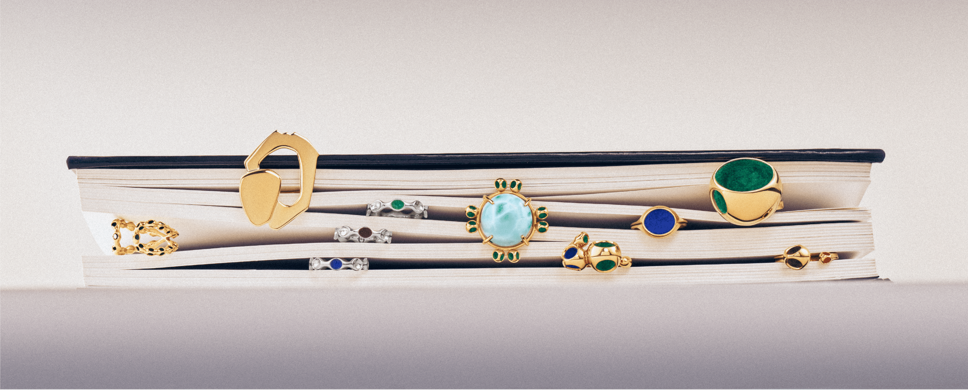 Monica Varela rings of different sizes displayed on a shelf